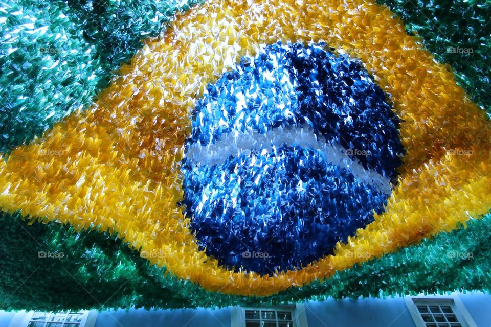 brazilian flag. streamers hung to look like the flag of brazil for the world cup