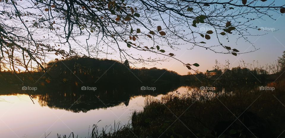 Lake at dawn with castle in the background