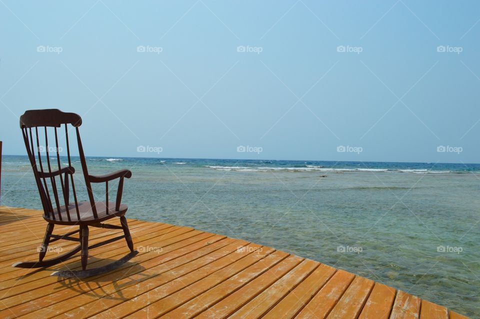 Rocking chair at the beach 