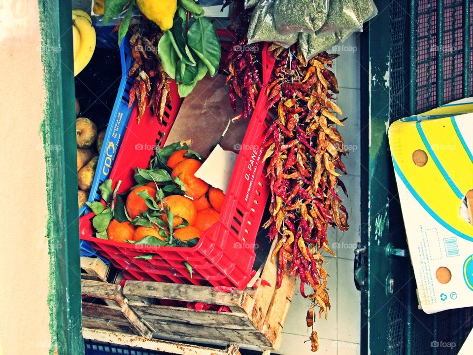 Tipical Italian shop of fruit and chili pepper