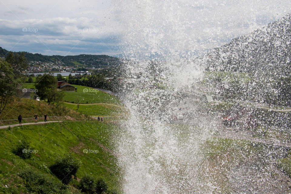 Behind the waterfall