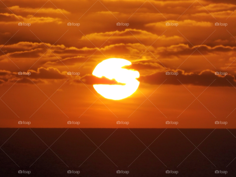 clouds sun sea sun set by philnaylor