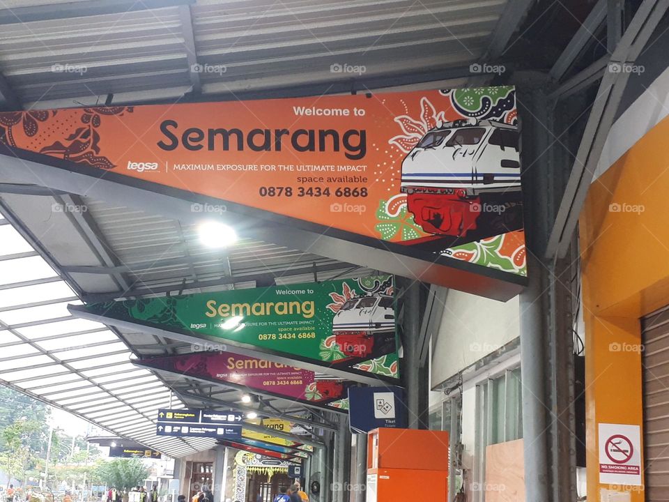 display board in the corridor next to the train departure gate