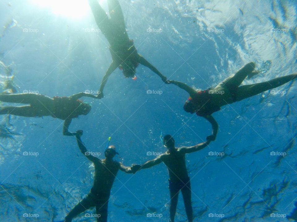 Friends in the sea water. Fernando de Noronha Brazil 