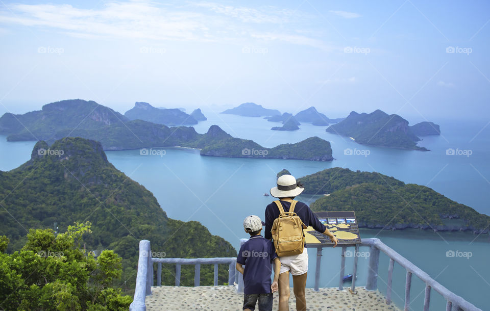 Mother and son on Pha Jun Jaras Viewpoint at Angthong Islands , Suratthani in Thailand