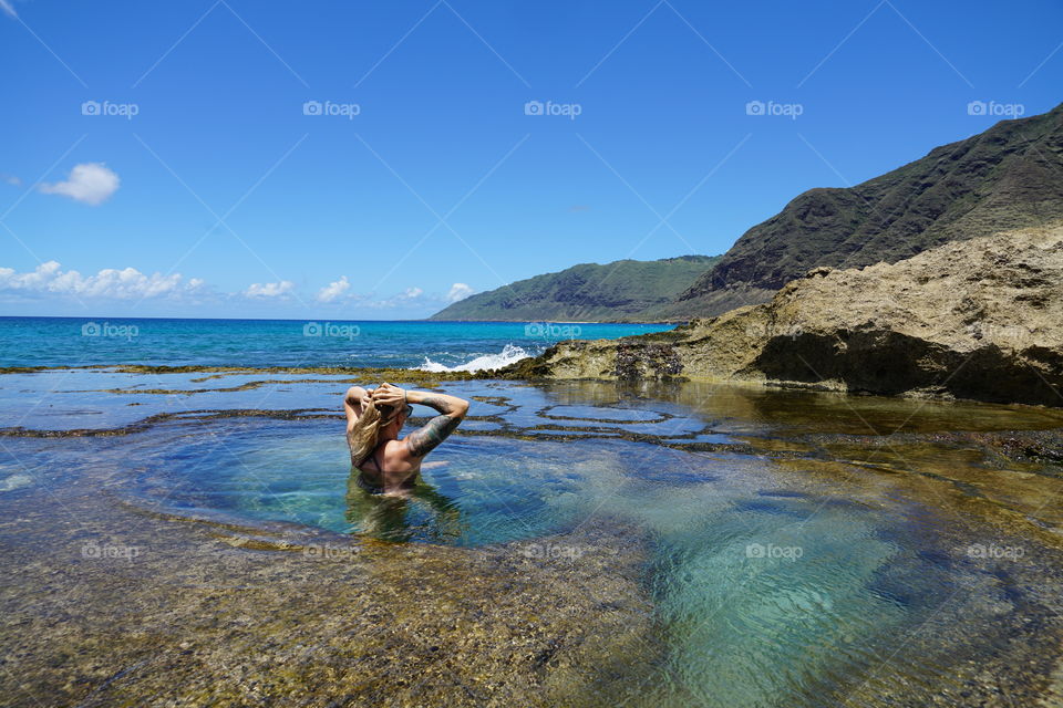 Beach lagoon with deep tide pools. Amazing landscape photo in the west shore of Hawaii. Relaxation and serenity in Hawaii 