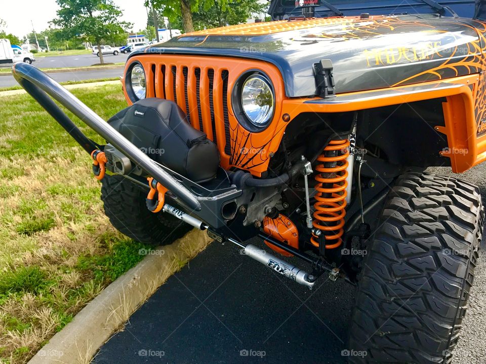 Front of Orange Jeep