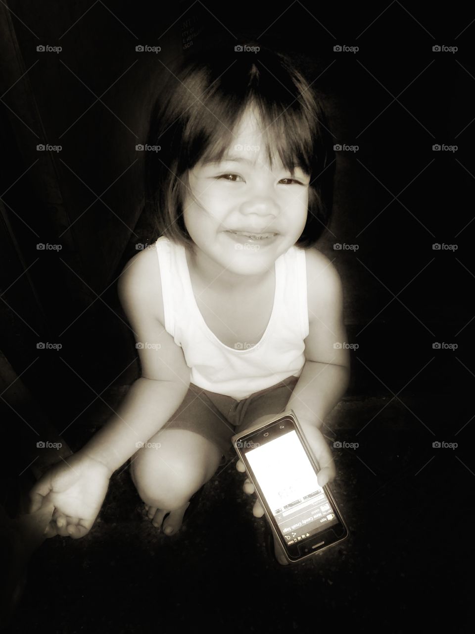 Child with a smartphone