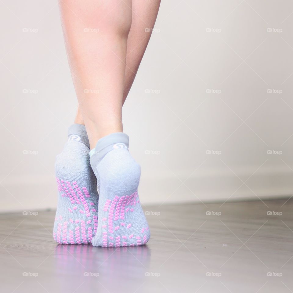 Close-up of ballerina's legs with ballet sock
