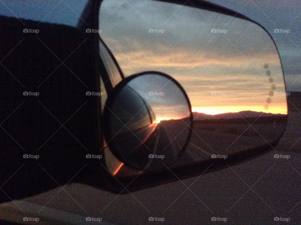 Sunset in review mirror 