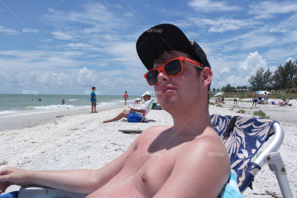 Sunbathing . Contemplating life from the perfect setting of Sanibel Island, Florida