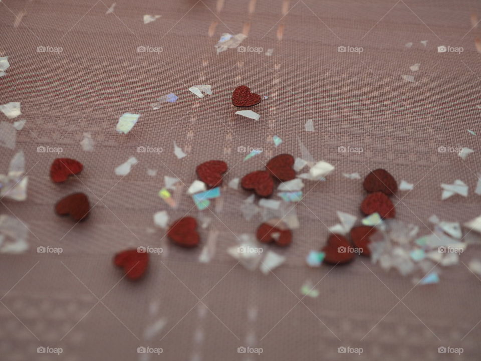 Close up hearts and glitter wedding confetti