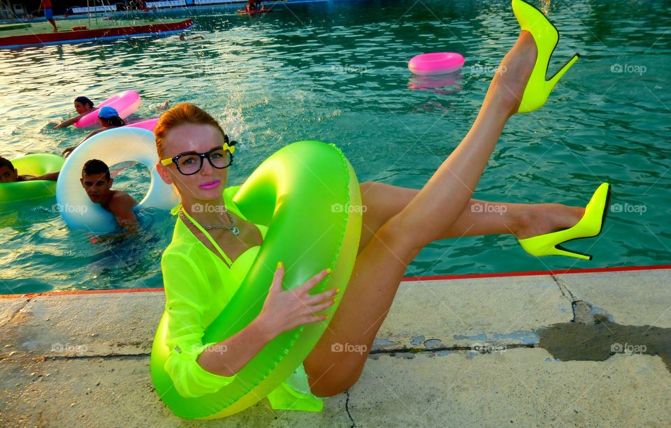 Beautiful girl in inflatable ring