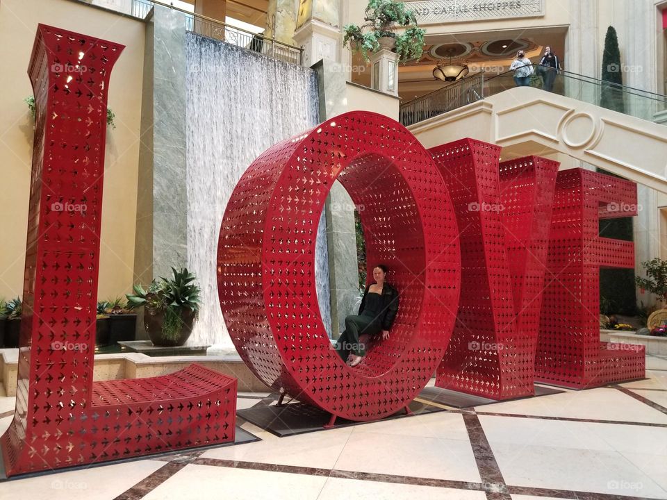 The word 'LOVE' - giant red letters.