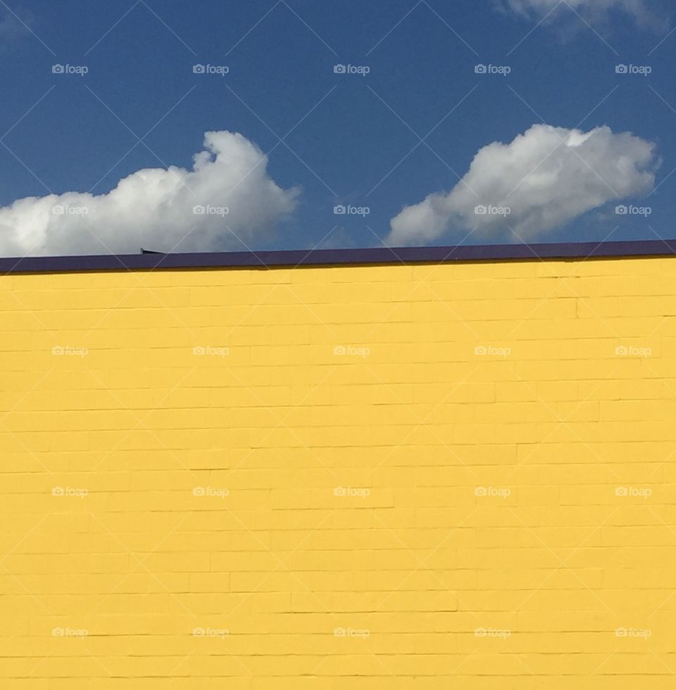 Yellow building blue sky