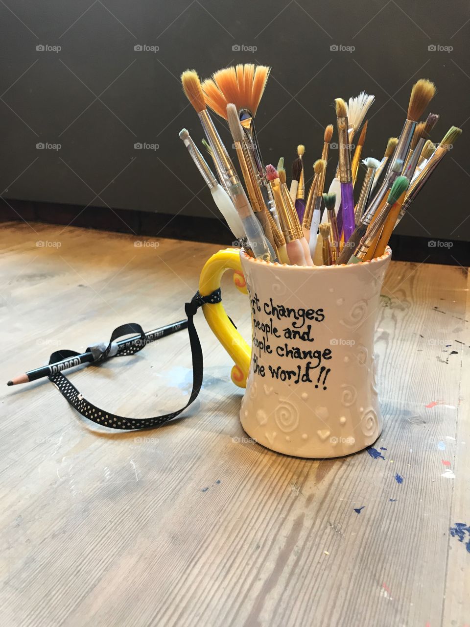 Paint brushes in a mug