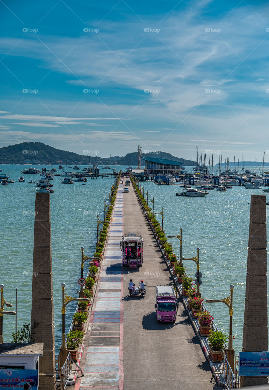 Beautiful scene of visitor's car on road of port in Phuket Thailand