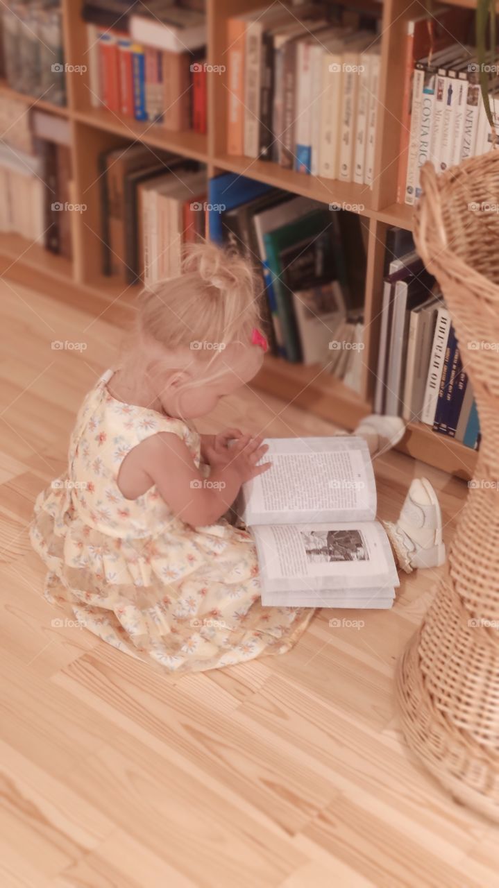 Kid and books