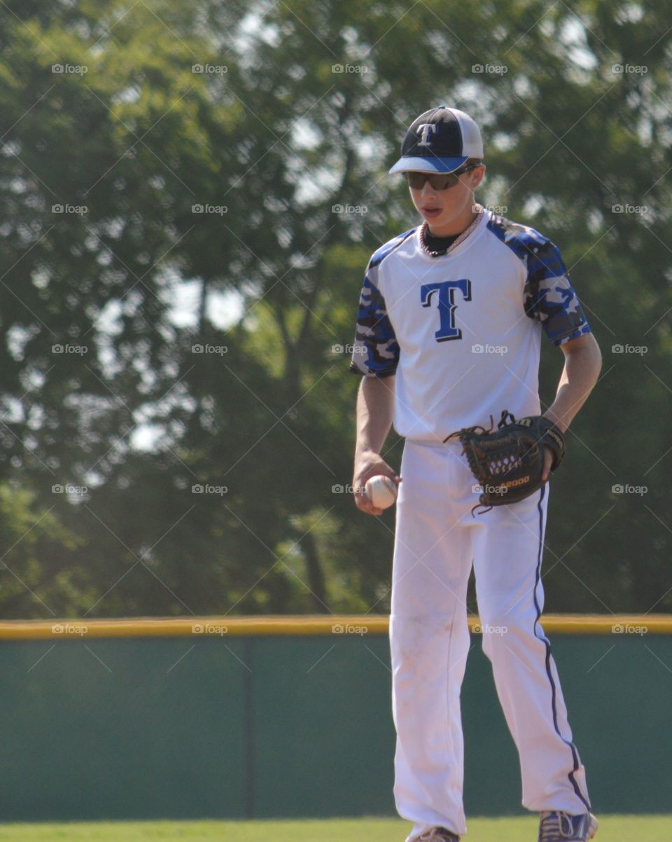 Baseball player playing in ground