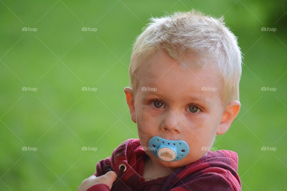 Cute toddler with tired eyes