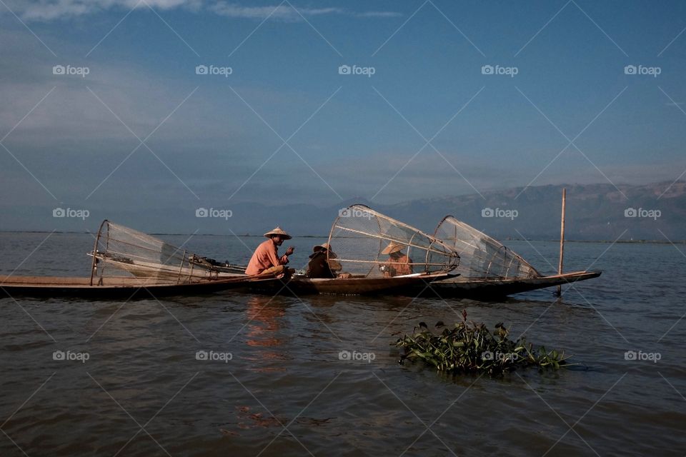 Fishermen resting after a catch