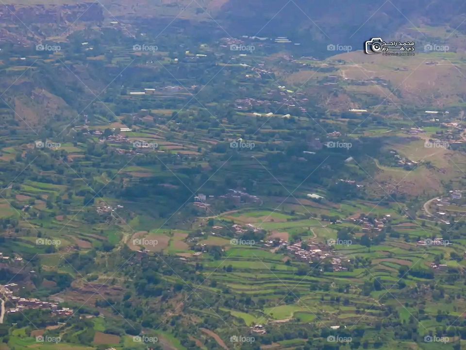 Glory be to God, the magnificent and picturesque view and the natural green trees are a view that is nothing more wonderful than it