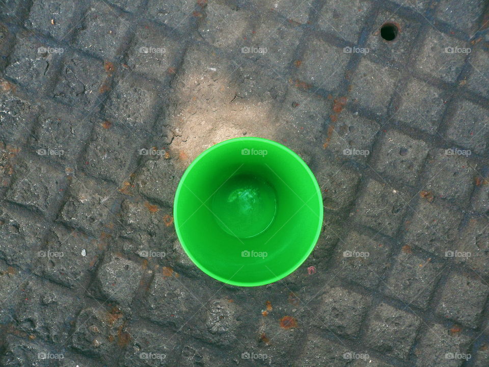 Green plastic glass