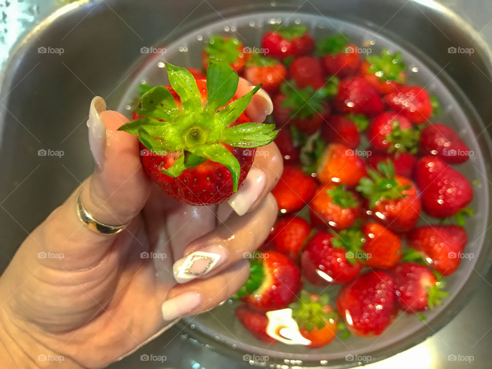 Washing fresh Strawberries 