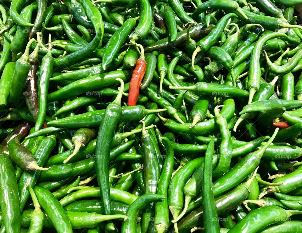 green peppers and one red at the street market