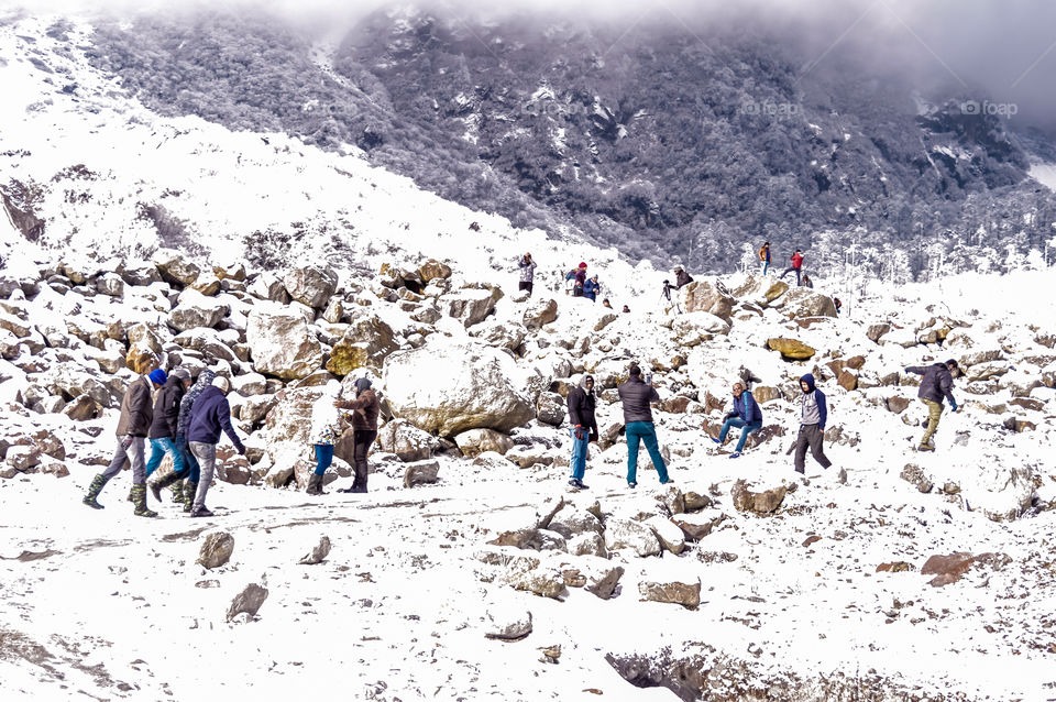 Auli, Himachal Pradesh, India December 2019 - People enjoying fresh snowfall. Normal life came to a standstill in Valley with heavy snowfall which suspended road, rail and air traffic to this region.