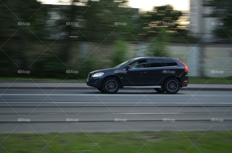 Black car in motion