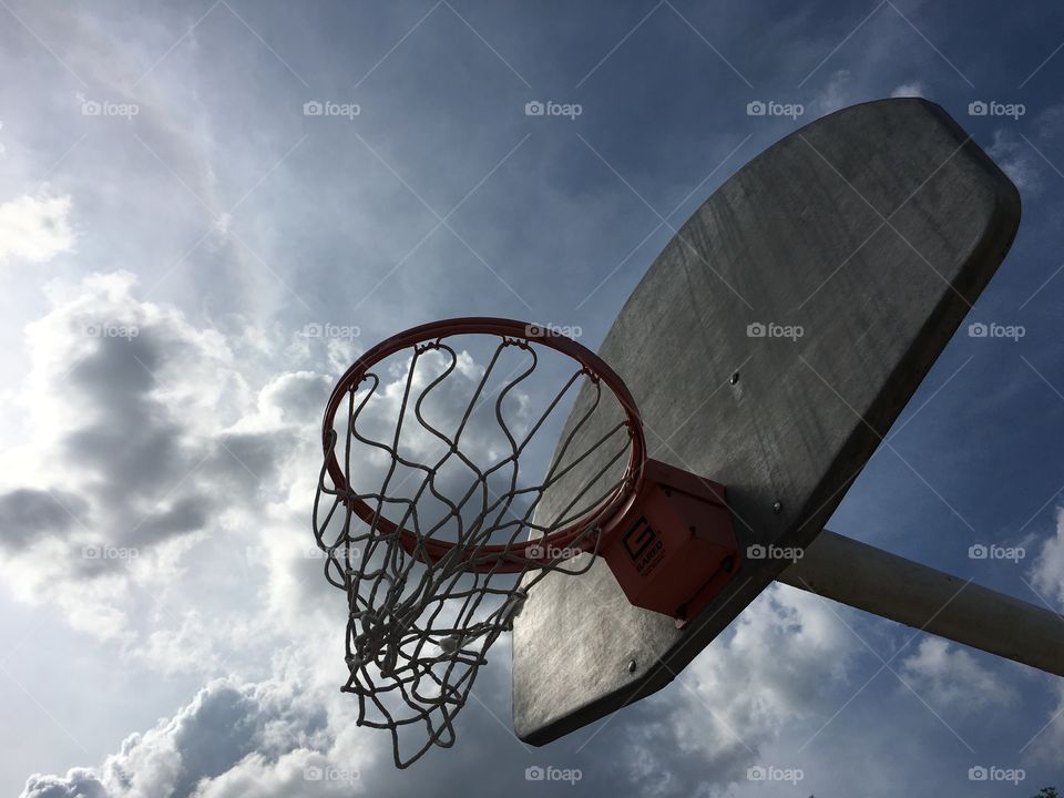 Picture Of A Basketball Hoop And rim with Backboard. Get you basketballs ready lets shoot. 