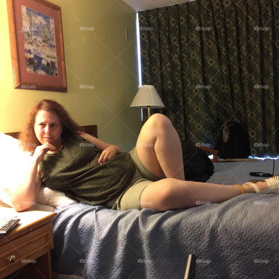 Lounging At Days Inn. Davenport, FL: 50-year-old on the Days Inn bed. August 2015.
