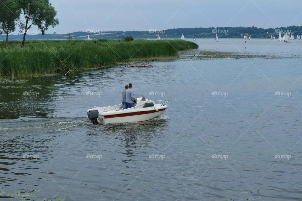 A motor boat swiming out onto Vistula river in Poland