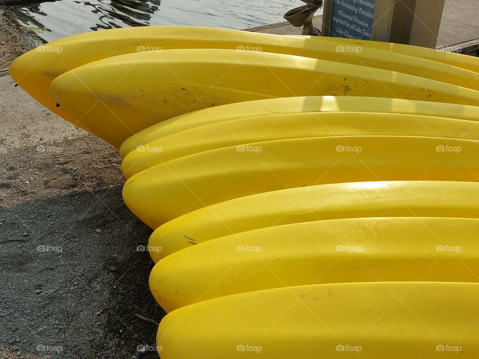 Yellow canoes. Bright yellow canoes