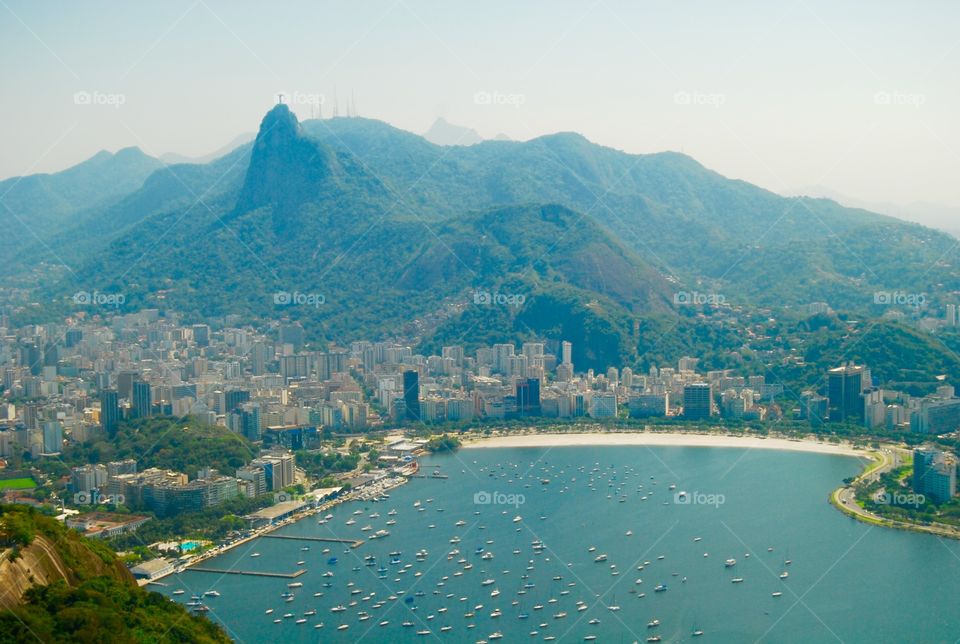 rio is brazil is rio. a breathtaking view of botafogo beach and the corcovado mountain with cristo redentor as seen from sugarloaf mountain.