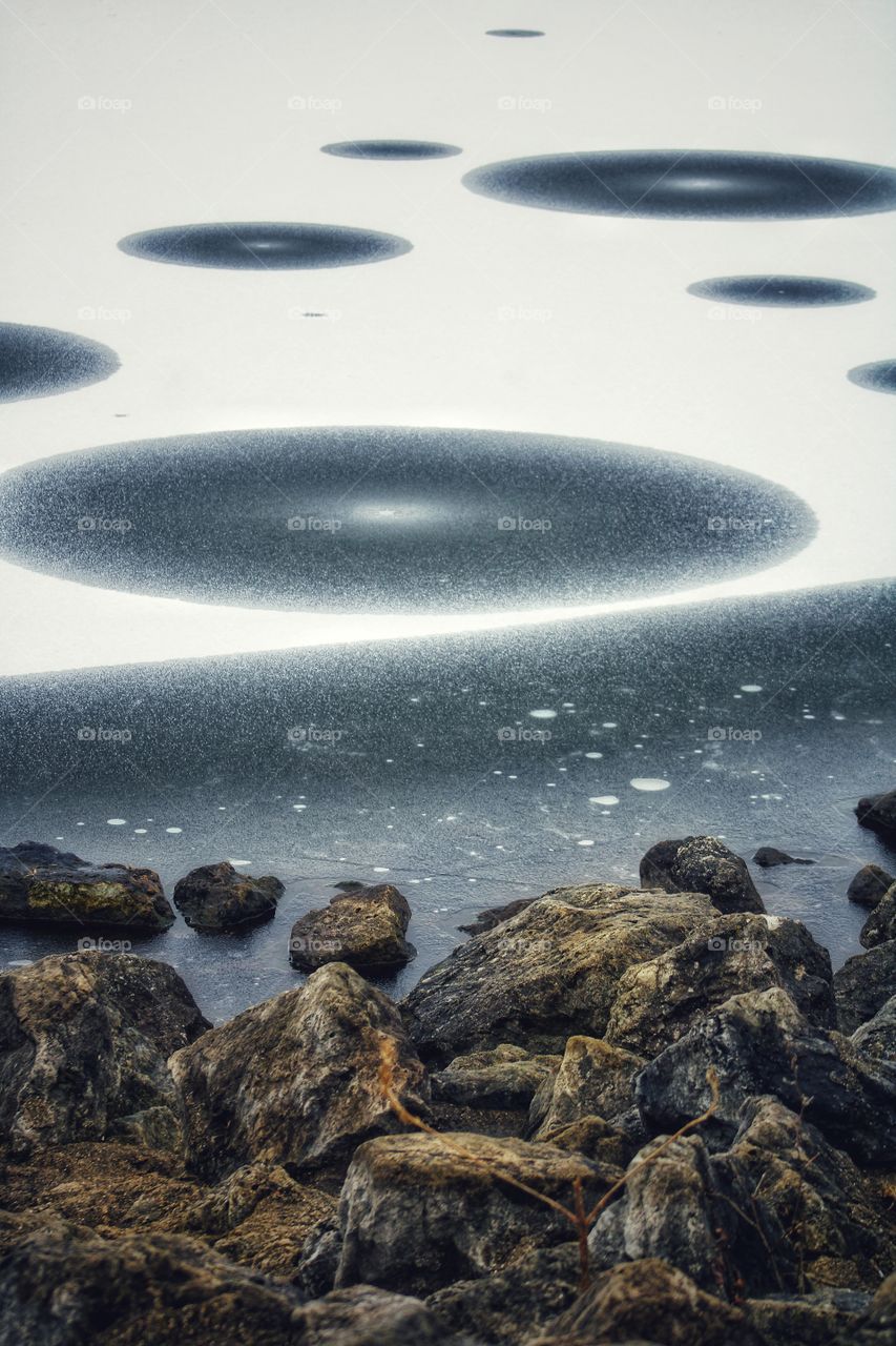 the frozen lake made pattern of circles