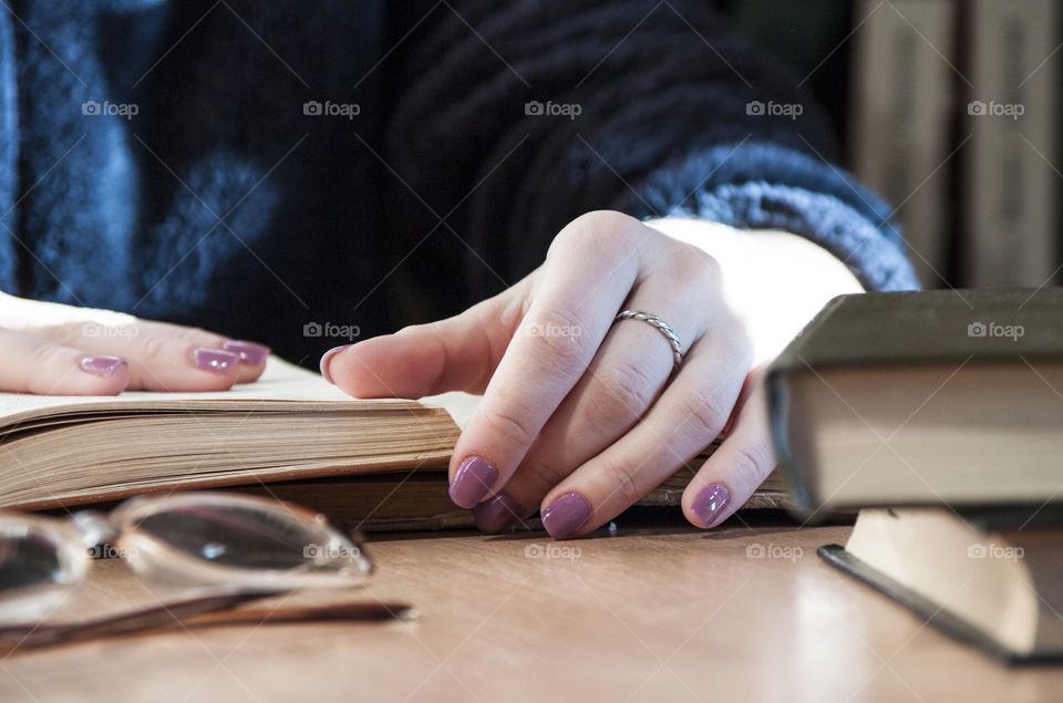 reading a book in the library