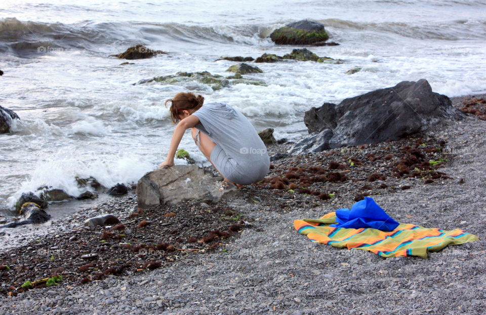 Girl alone at the empty beach