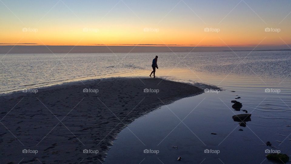 Girl on sand bank