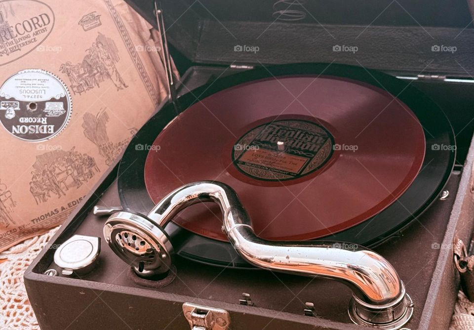 Antique Phonograph crank box plays nostalgic 78 RPM vinyl records