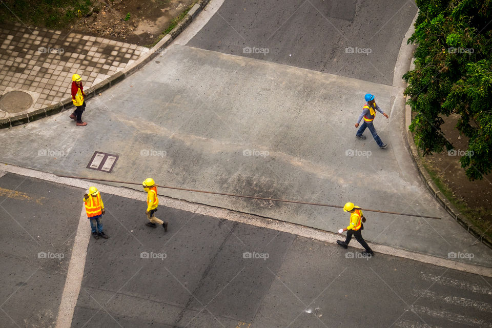 construction workers passing by