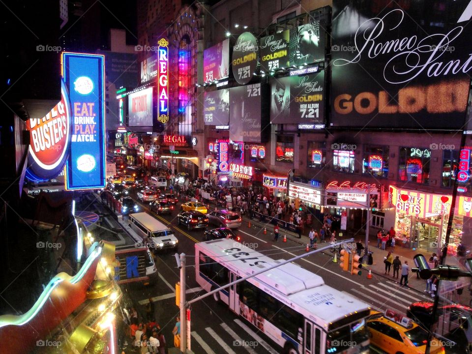 NYC street with intense traffic at night.