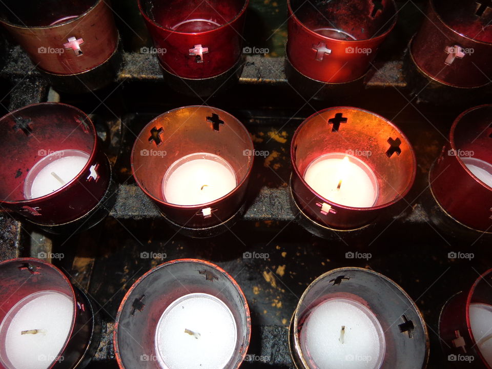 votive candles. memorials to friends long gone