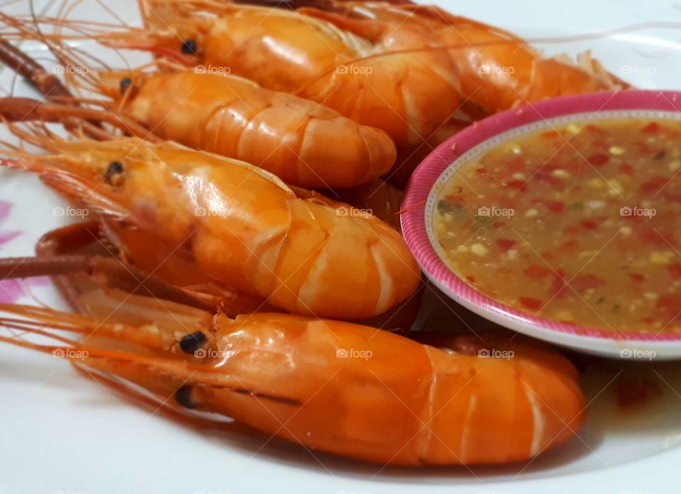 Cooked prawns with sauce ready to eat