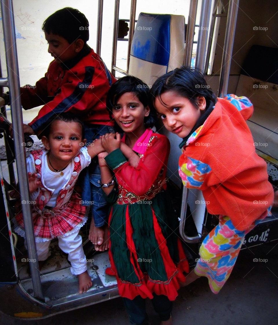 Indian Kids on a Rickshaw