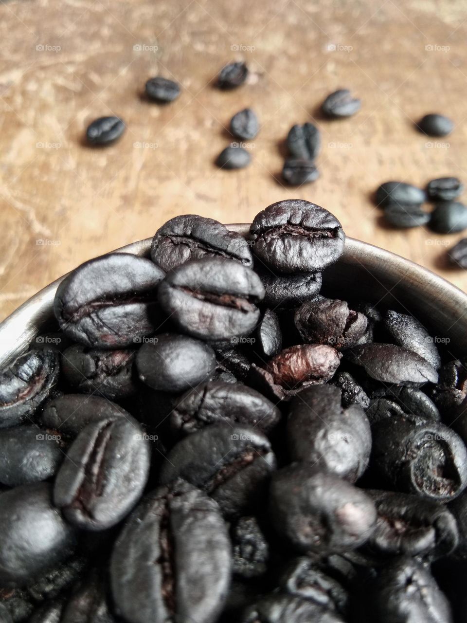 pile of roasted coffee beans