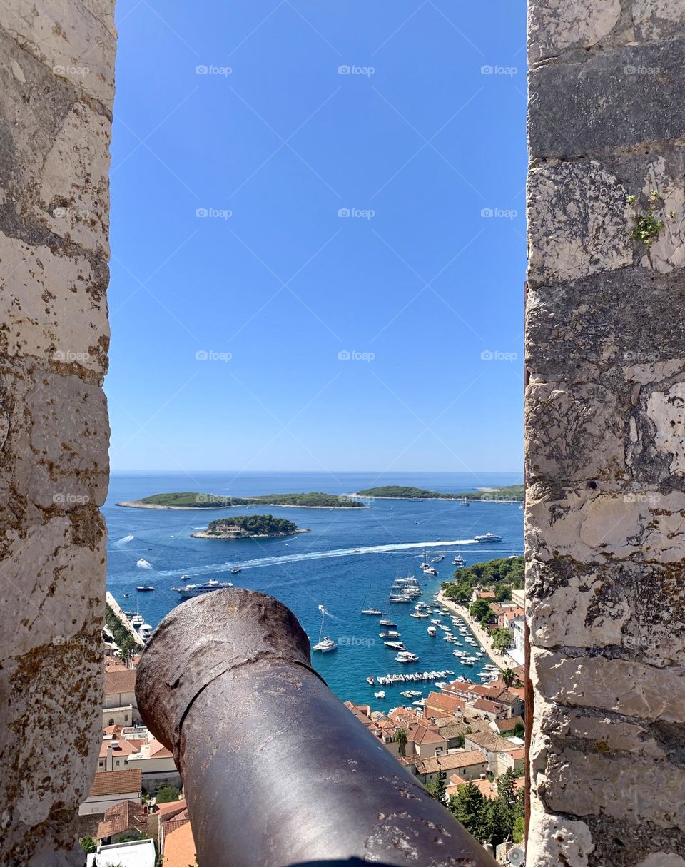 Take a shot, cannon view of harbour and islands