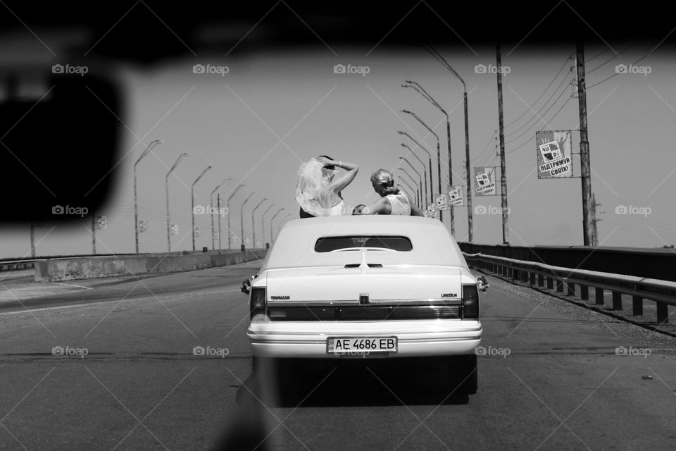 girls in car wedding