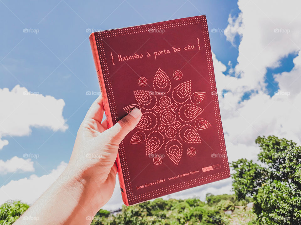 Livro Batendo a porta do Céu